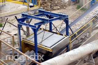 Magnetic separator - removal of tramp iron from limestone aggregate.