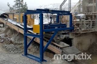 Magnetic separator - removal of tramp iron from limestone aggregate.