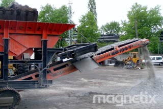 Magnetic separator - recovery of iron scrap from construction rubble.
