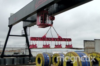 Cross-beam lifting magnets - moving a 12 m long steel sheet.